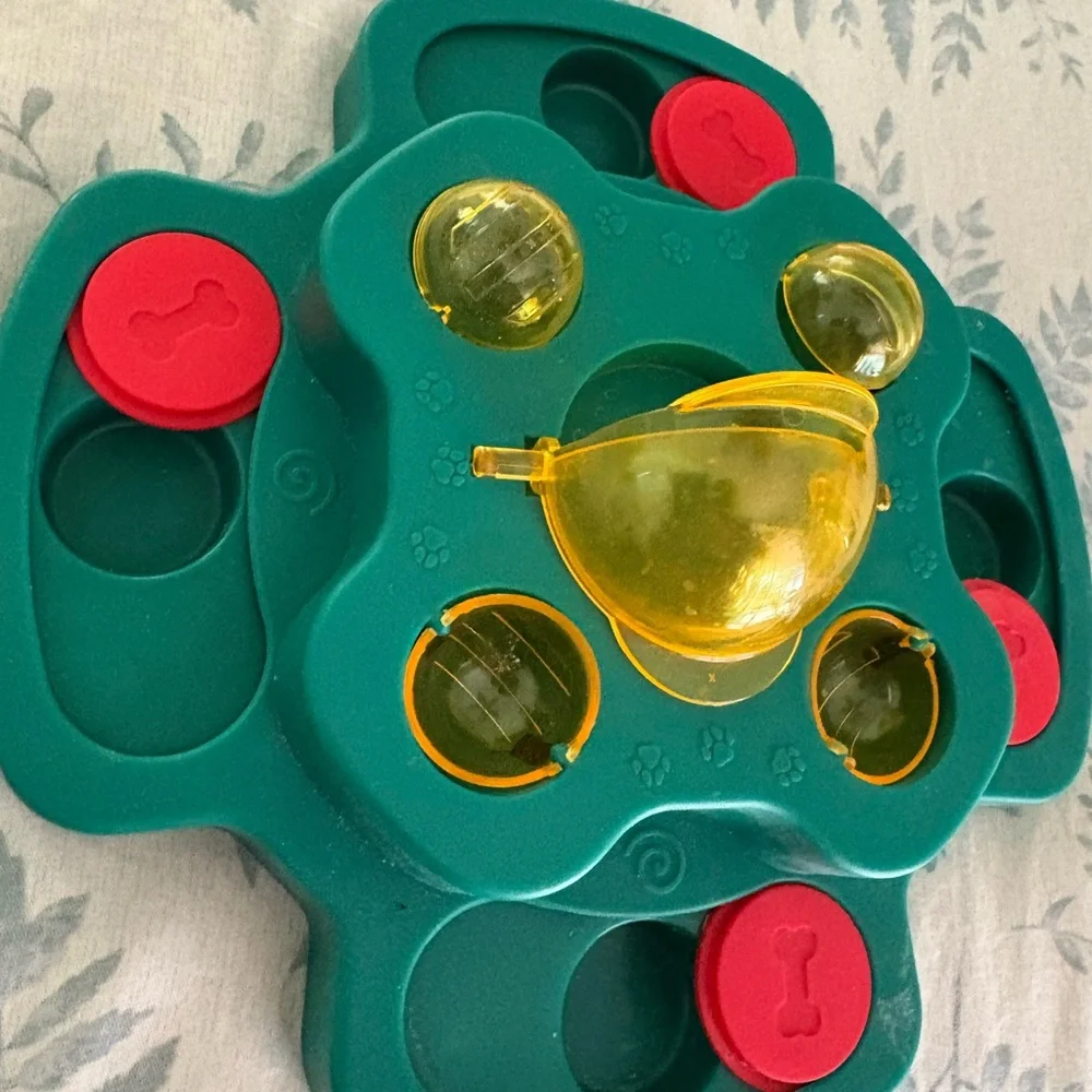 Interactive Green and Yellow Puzzle Feeder/Toy for dogs.